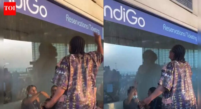 IndiGo cancellations: Foreigner loses cool, climbs atop counter at Mumbai airport | Mumbai News