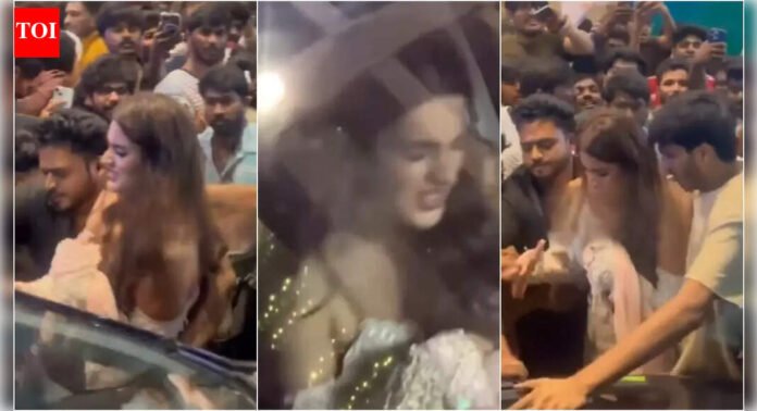 Nidhhi Agerwal gets mobbed and manhandled by fans at 'The Raja Saab' song launch event; netizens react, calling it 'HIGHLY DISTURBING' |