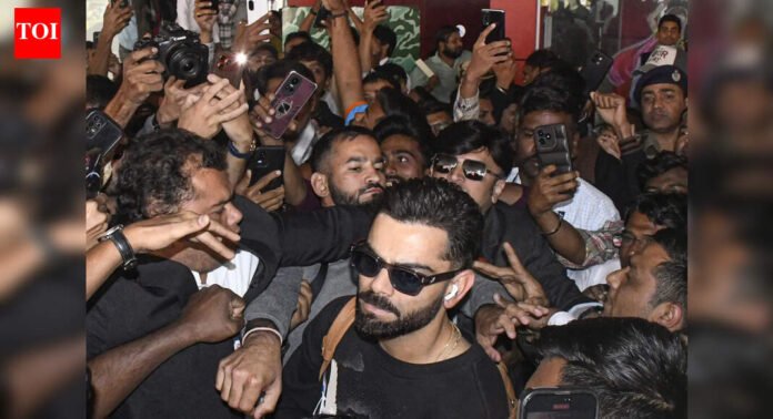 Scenes of frenzy: Virat Kohli gets mobbed on arrival in Vadodara - Watch | Cricket News