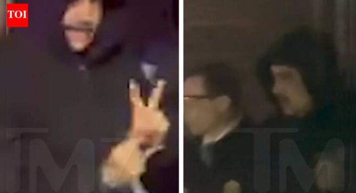 Venezuelan President Maduro flashes peace sign while in custody — watch