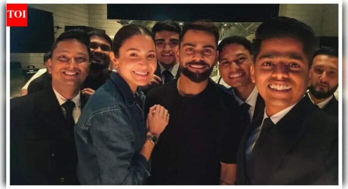 Virat Kohli and Anushka Sharma are all smiles as they pose with hotel staff in Dubai - PICS﻿﻿ |