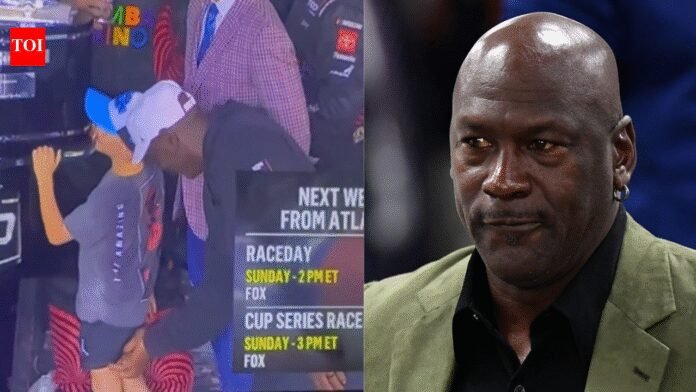 Michael Jordan under fire after post-race celebration gesture toward child goes viral |