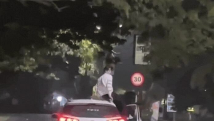 No one at the wheel? Youth performs stunts on moving car's roof, arrested after video goes viral | Bhopal News
