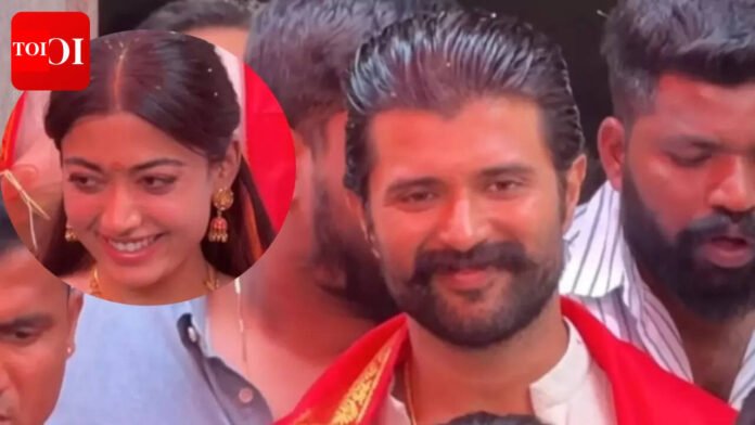Vijay Deverakonda shields Rashmika Mandanna from crowds during Hyderabad temple visit - Watch Video | Telugu Movie News