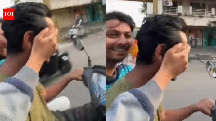 Man rides scooter blindfolded on Maharashtra's Dombivli bridge, 3 held | Thane News